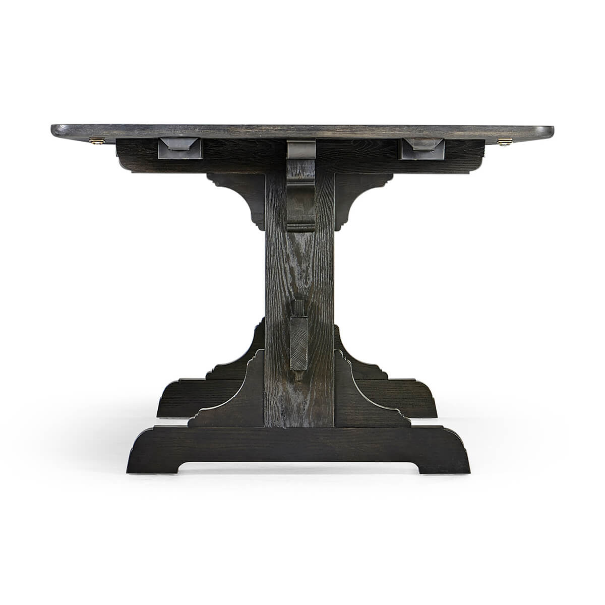Dining table, end view highlighting trestle design.