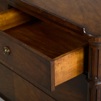 Dark French Louis XVI commode, open top drawer showing interior.