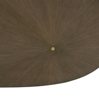 Close-up detail of wood pattern on oval dining table.