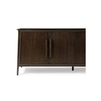 Close-up of dark mid-century credenza front with handles.