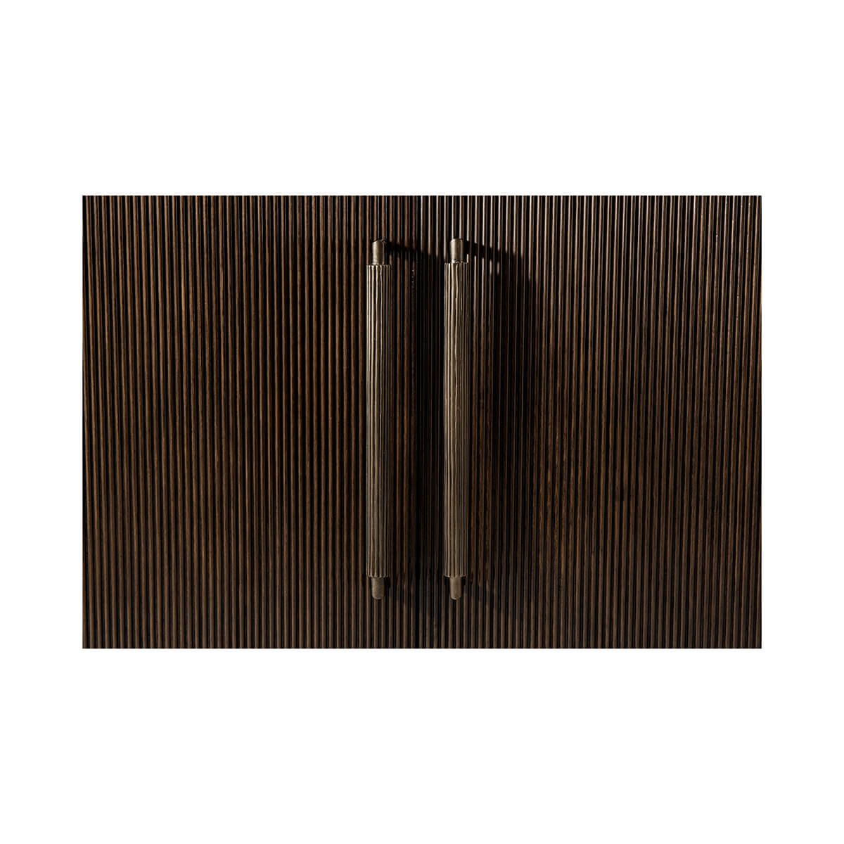 Detail of dark mid-century credenza textured doors and handles.