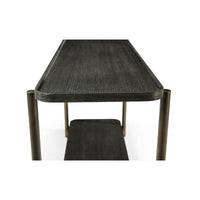 Close-up of dark oak console table corner detail.