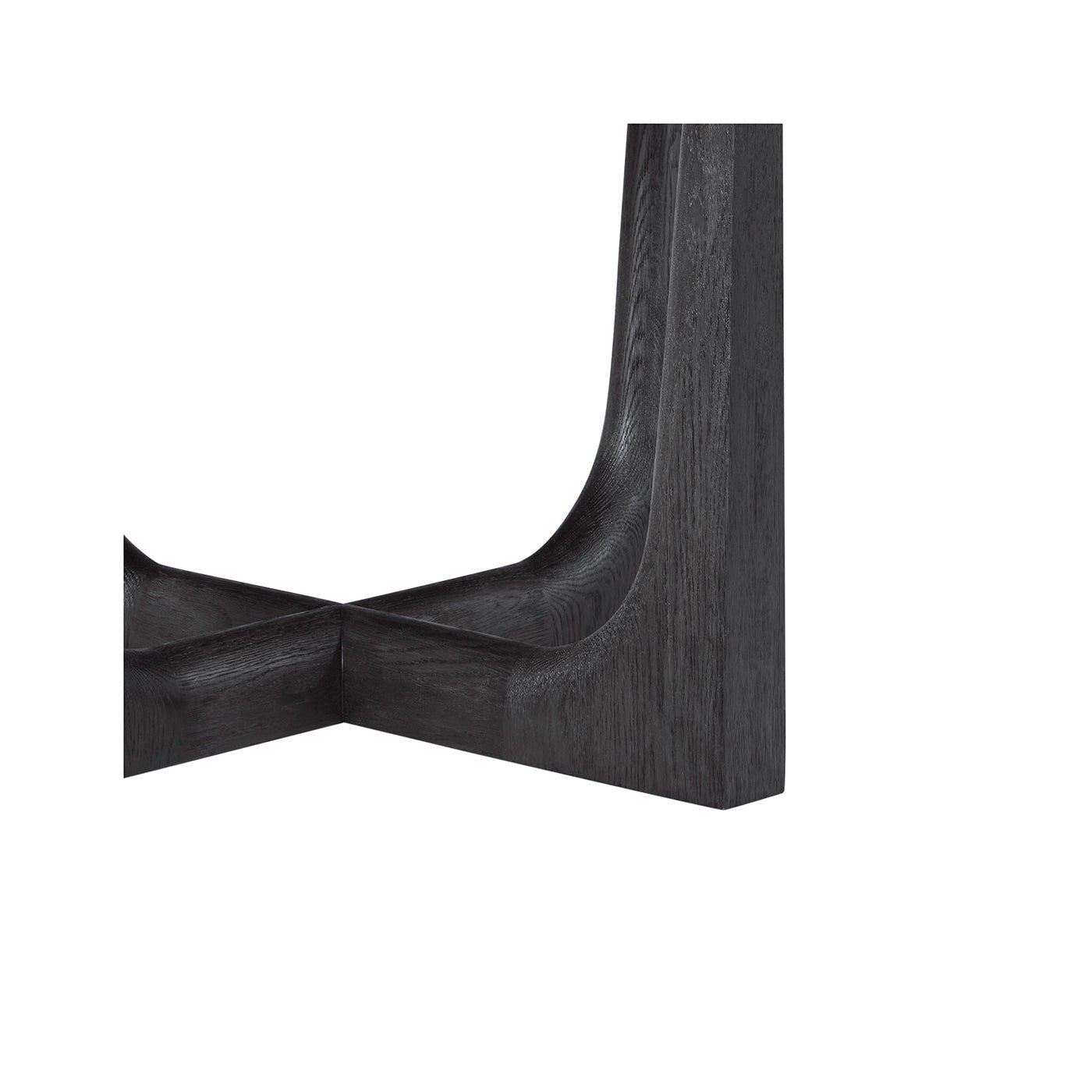 Close-up of dining table's dark oak base joint.