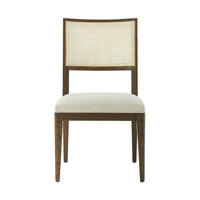 Frontal view of dark oak dining chair.