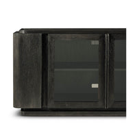 Close-up on cabinet detail of dark oak modern console.