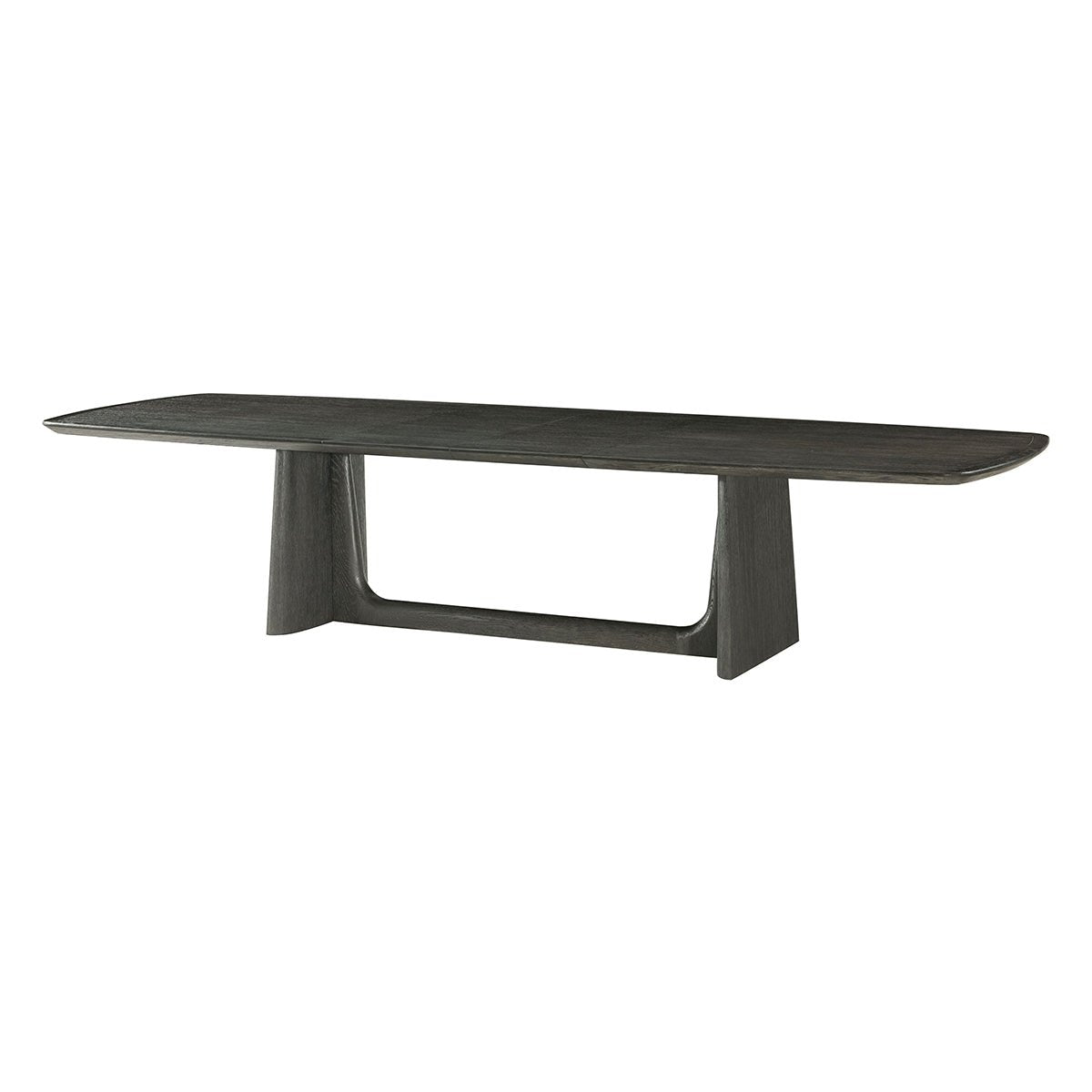 Dark oak dining table, angled side view.