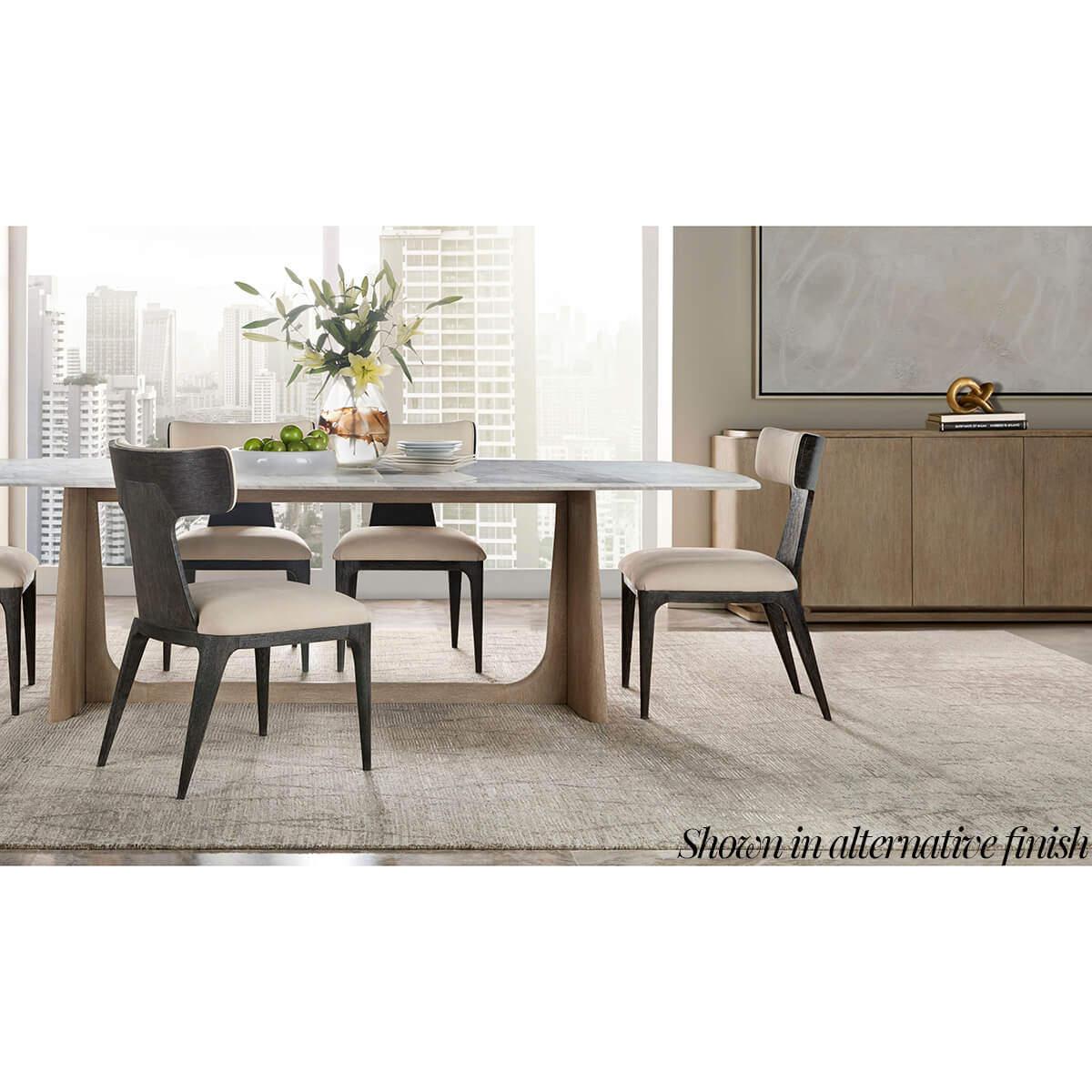 Dining room with dark oak buffet, styled setting.