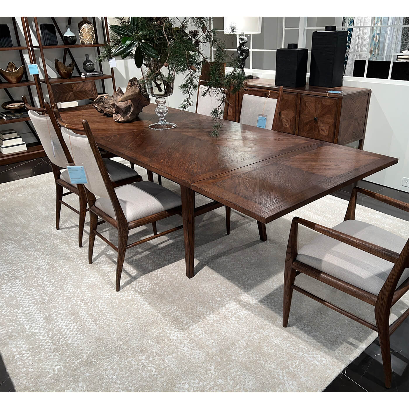 Close-up of dining table setup with chairs.