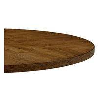 Close-up of tabletop showing dark oak wood grain.