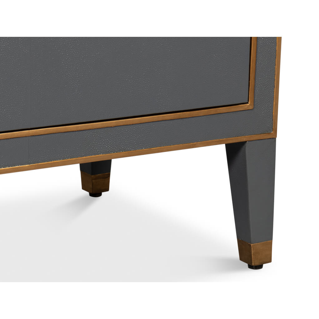 Lower corner and leg detail of dark silver nightstand.