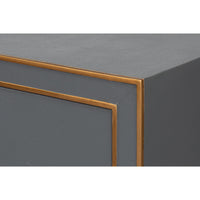Close-up of gold trim on dark silver nightstand.