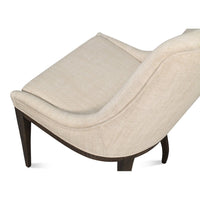 Angled view of beige dining chair and seat.