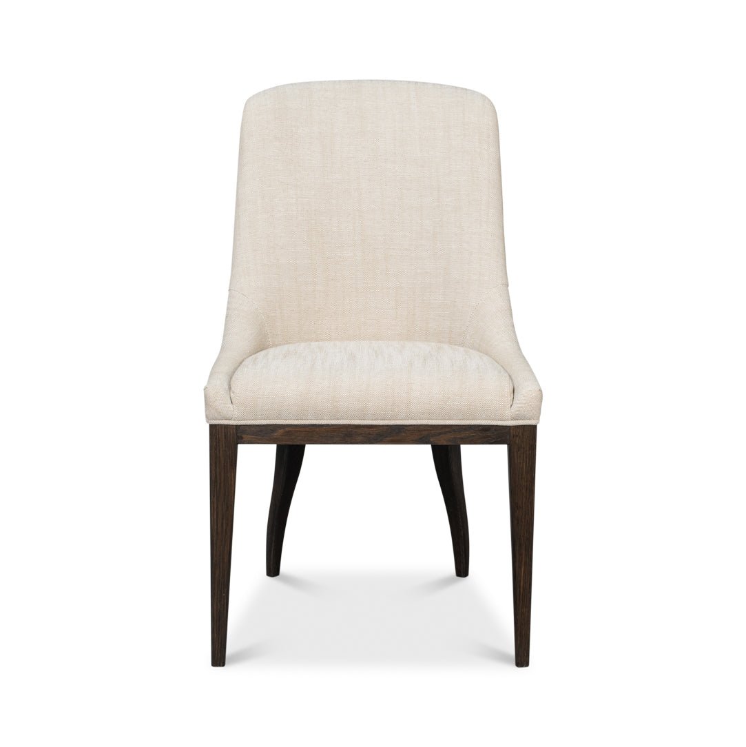 Beige upholstered dining chair, front view.