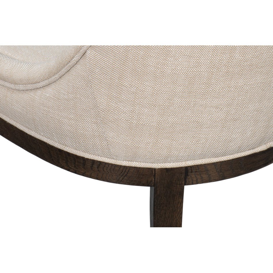 Close-up of chair leg and fabric texture.