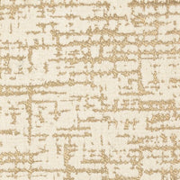 Beige textured fabric pattern on modern accent chair, close-up.