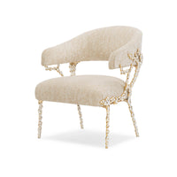 Beige modern accent chair with textured fabric, angled view.