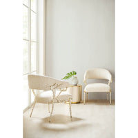 Two modern accent chairs by window, minimalist decor.