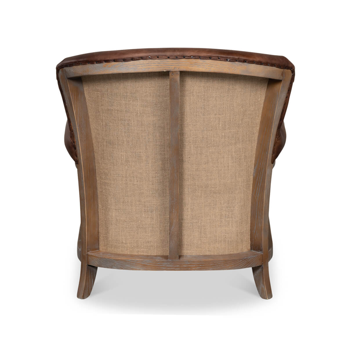 Back view of club chair with exposed wooden frame.