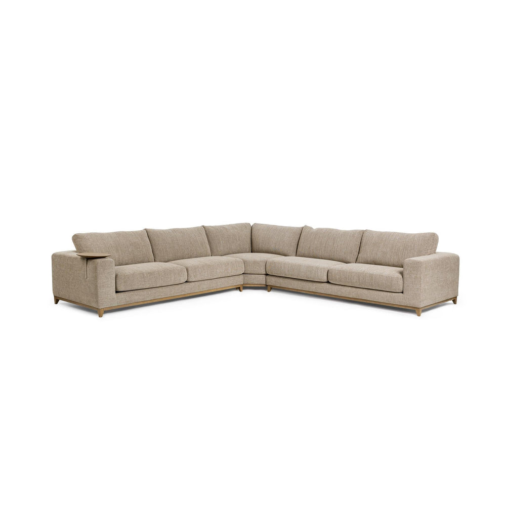 Angled front view of beige deep seat sectional with a wood base and round table at the arm