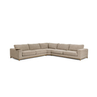 Angled front view of beige deep seat sectional with a wood base and round table at the arm