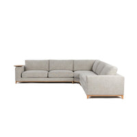 Opposite front-angle view of sand sectional showing its long seating run and square arm