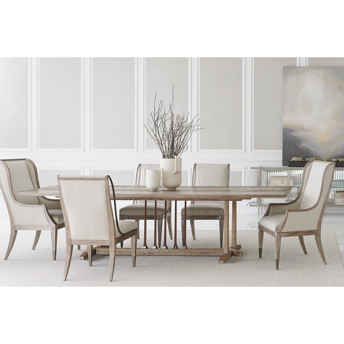 Dining table, room setting with chairs and decor.