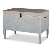 Pine trunk side table in distressed gray paint with a natural wood top and an iron latch