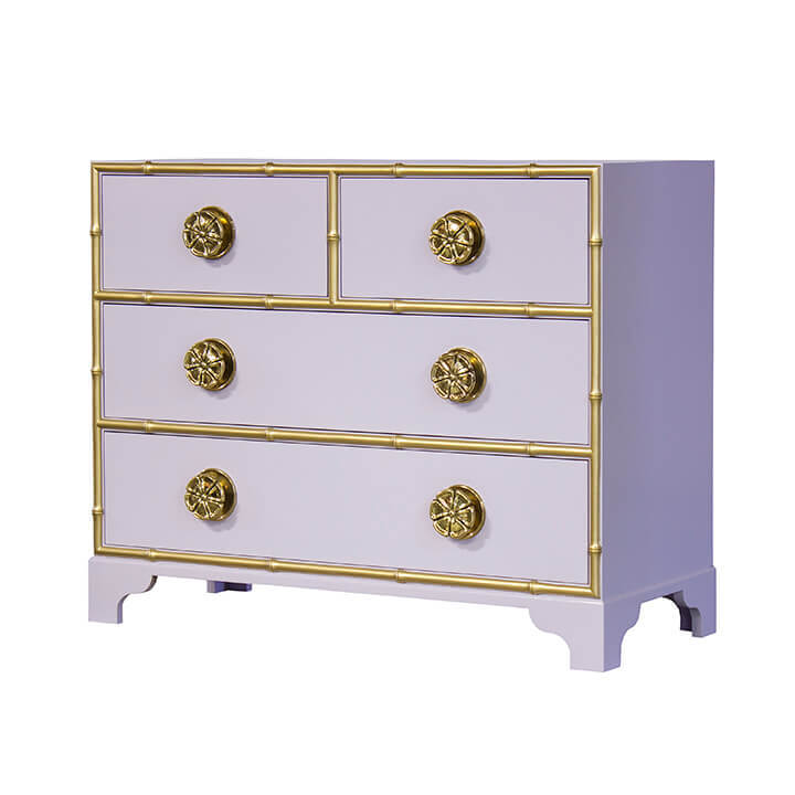 Lavender dresser with gold accents and ornate knobs.
