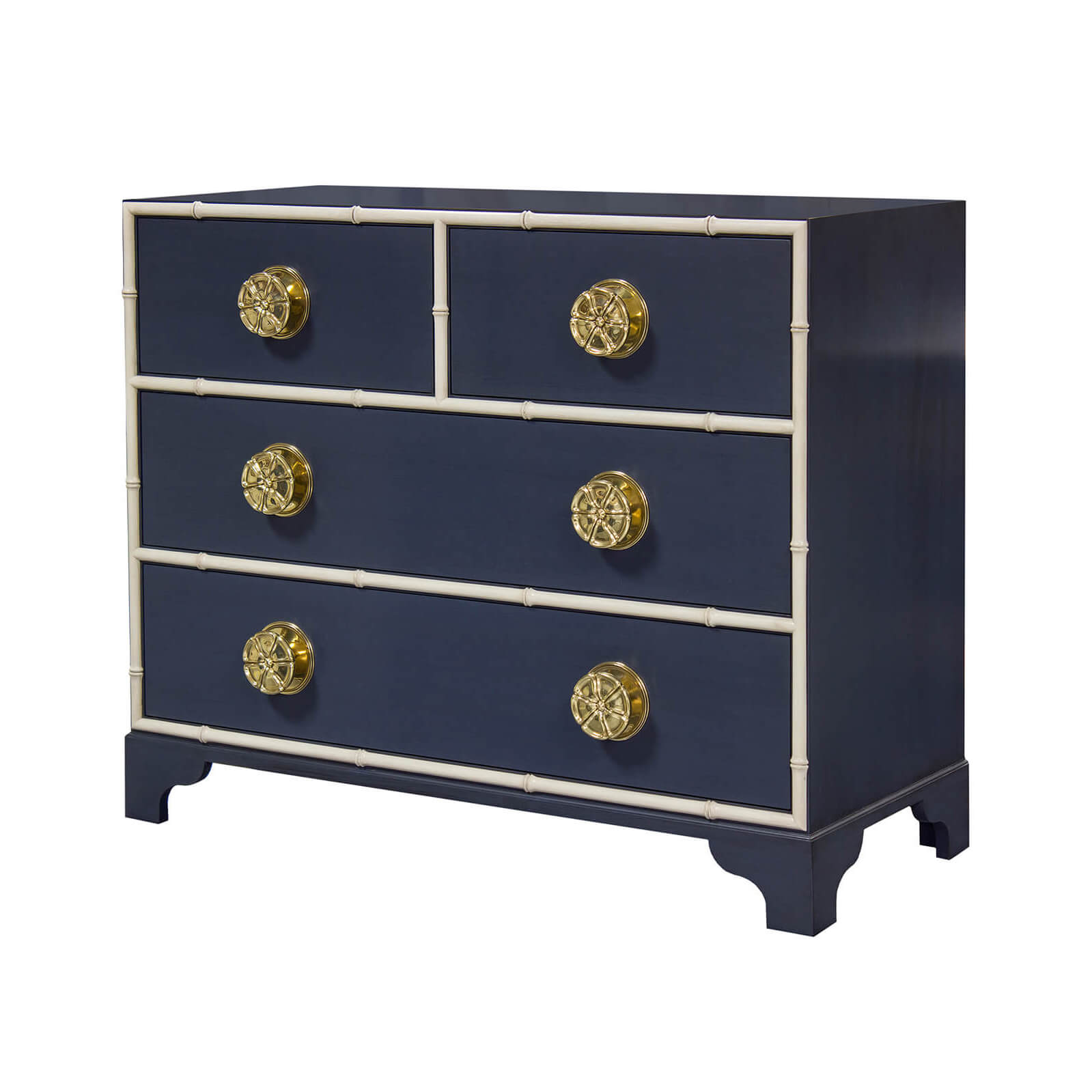 Navy dresser with white accents and ornate knobs.