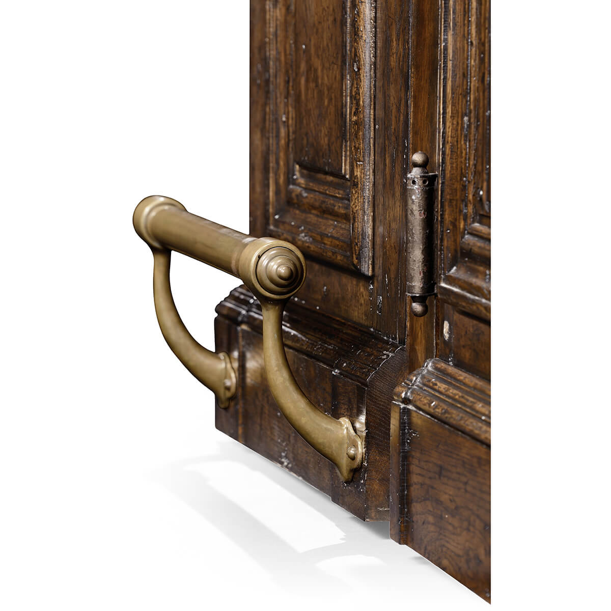 Early English antique bar, foot rail close-up