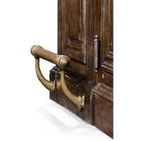 Early English antique bar, foot rail close-up