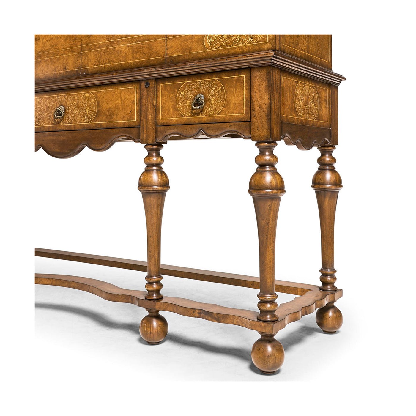 Close-up of cabinet legs on antique style TV cabinet.