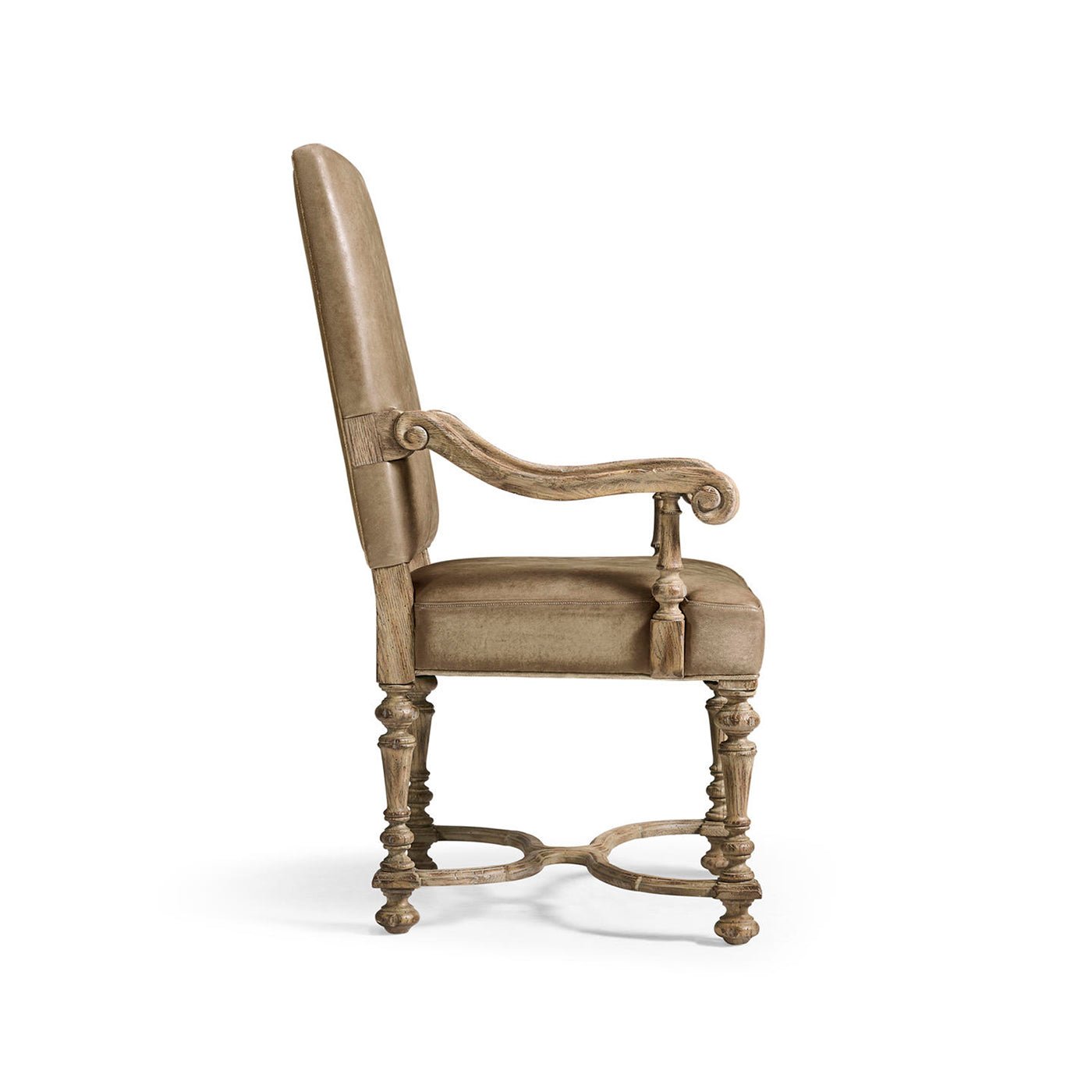 Side profile of Early English leather armchair.
