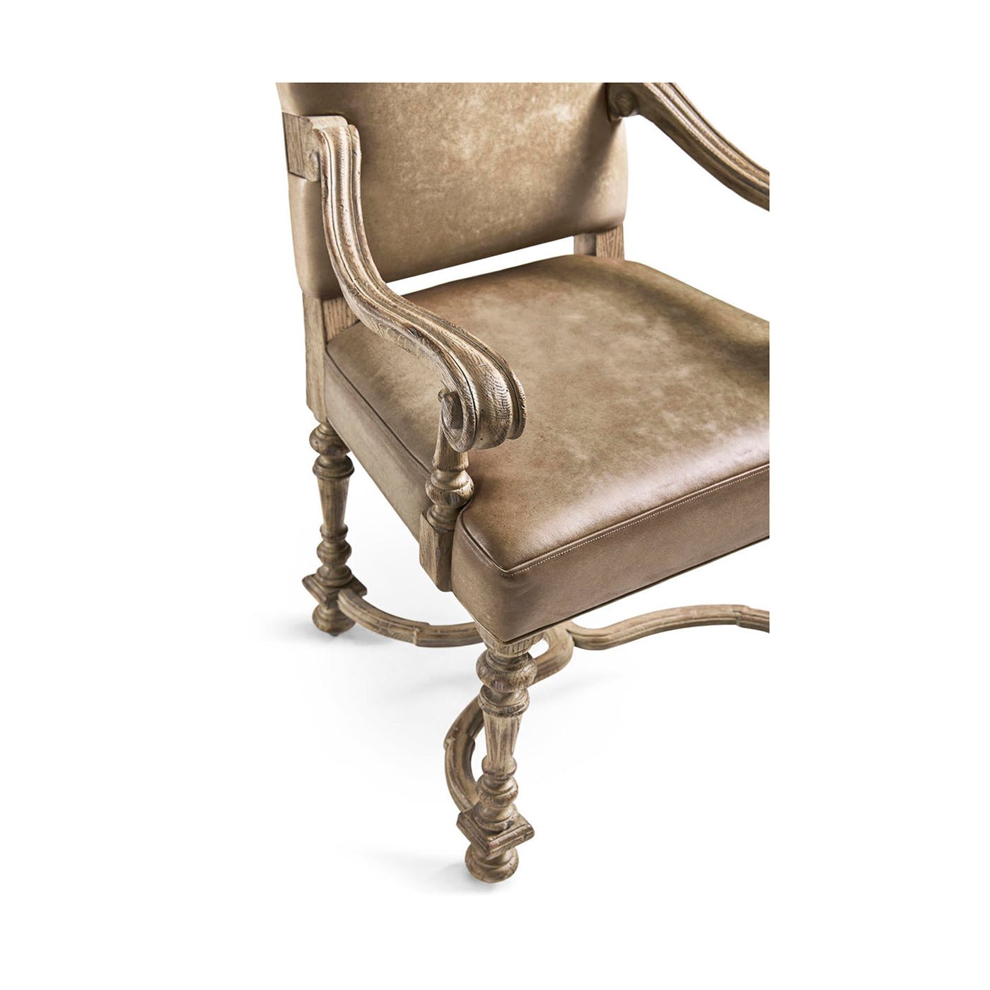 Close-up of Early English armchair armrest detail.
