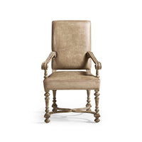 Front view of Early English leather armchair.