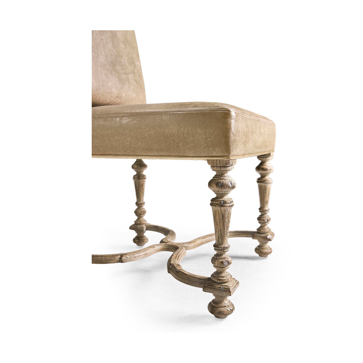 Early English chair, detailed leg and support design.