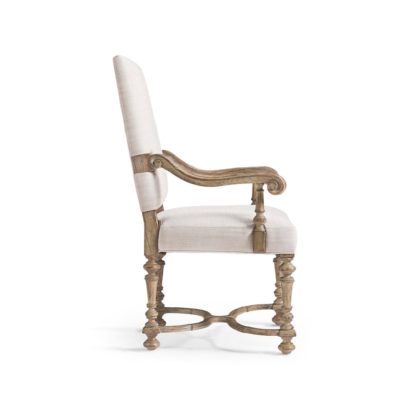 Side profile of armchair, elegant silhouette and legs.