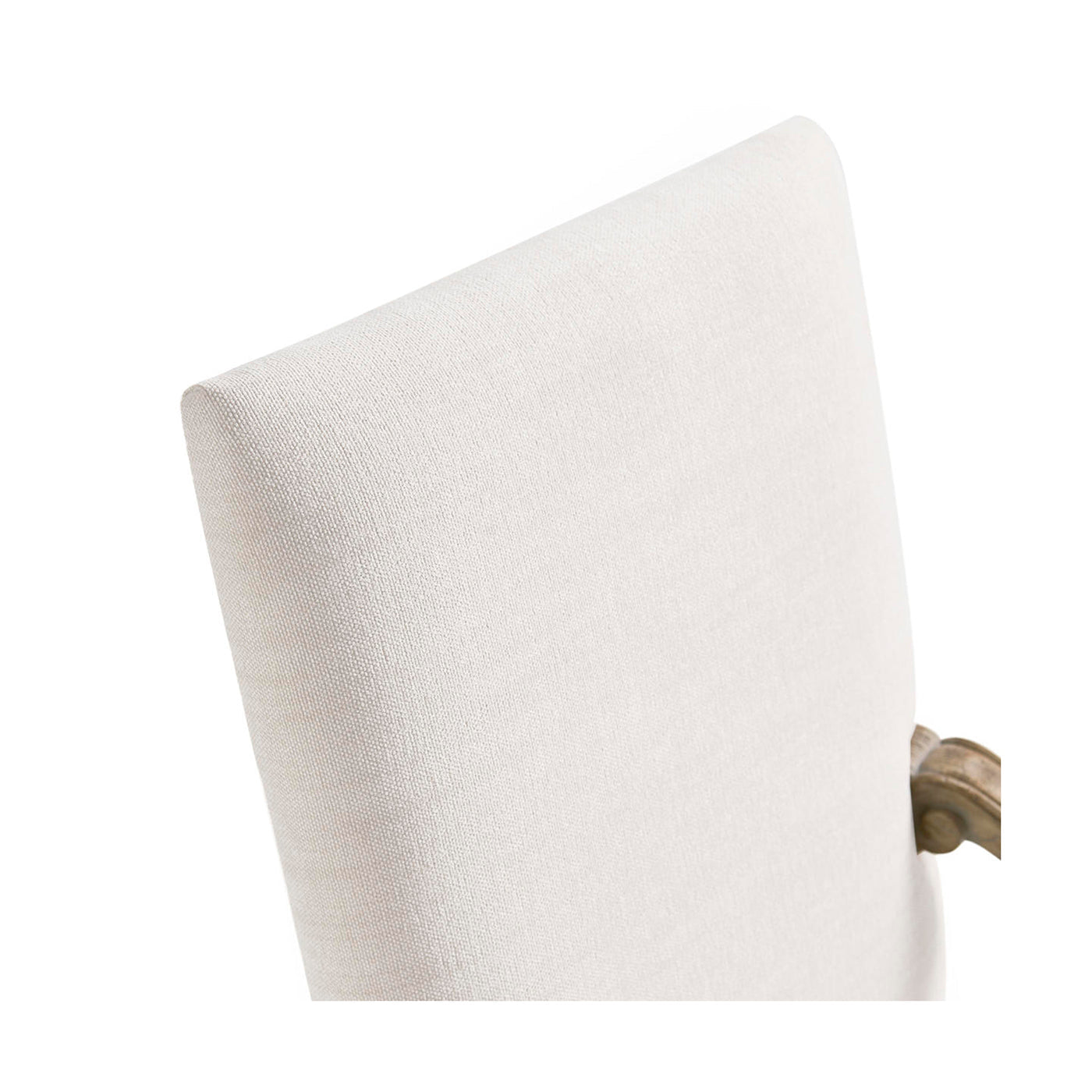 Close-up of armchair backrest, smooth fabric texture.