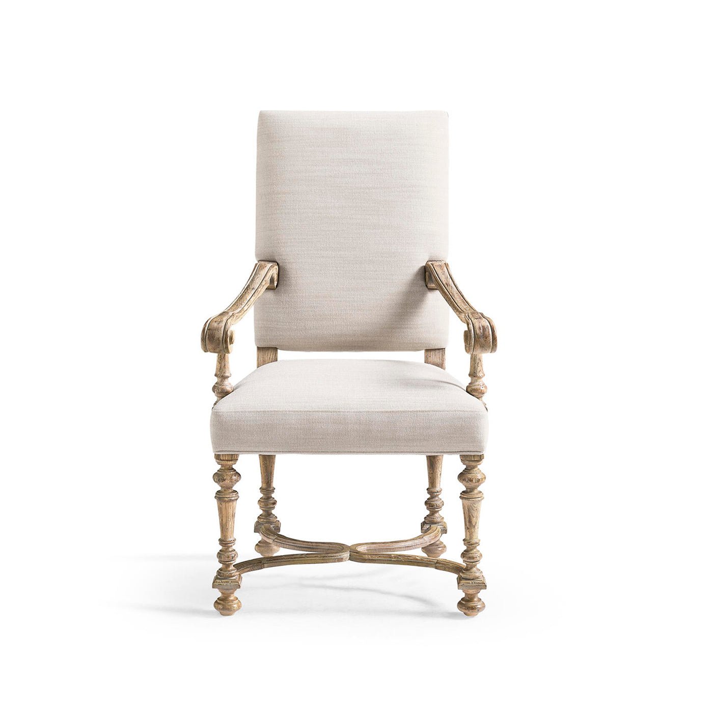 Front view of the upholstered armchair with ornate legs.