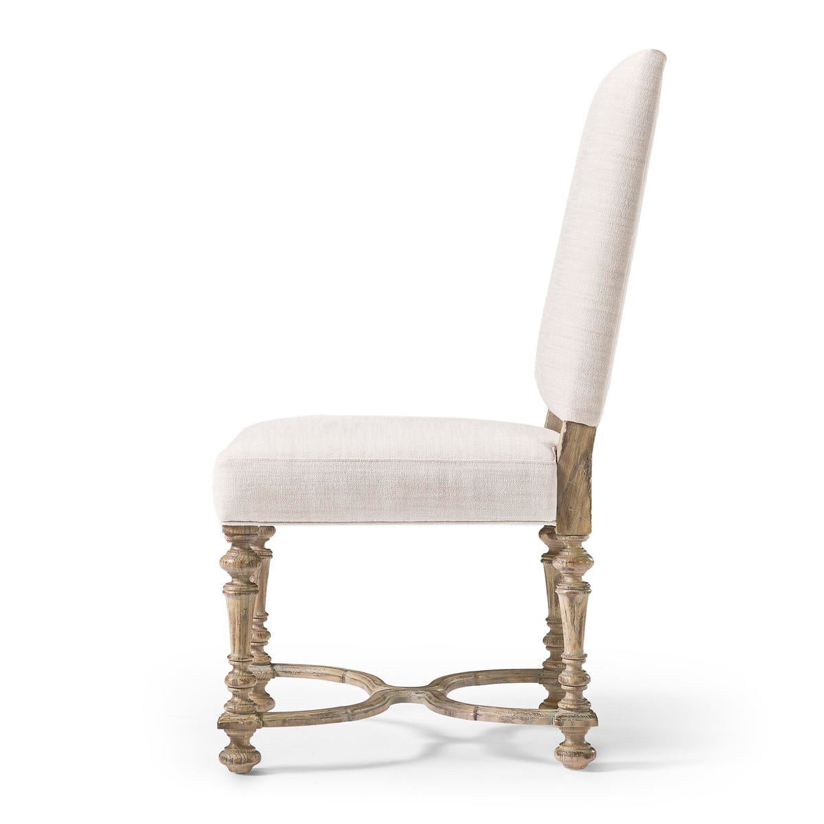 Side profile of Early English upholstered side chair.
