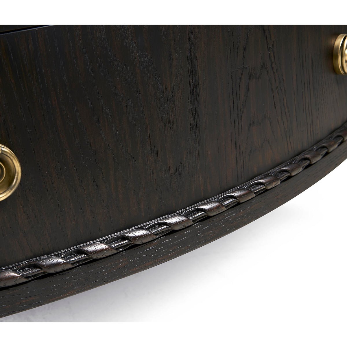 Textured wood detail of ebonized marble top chest.