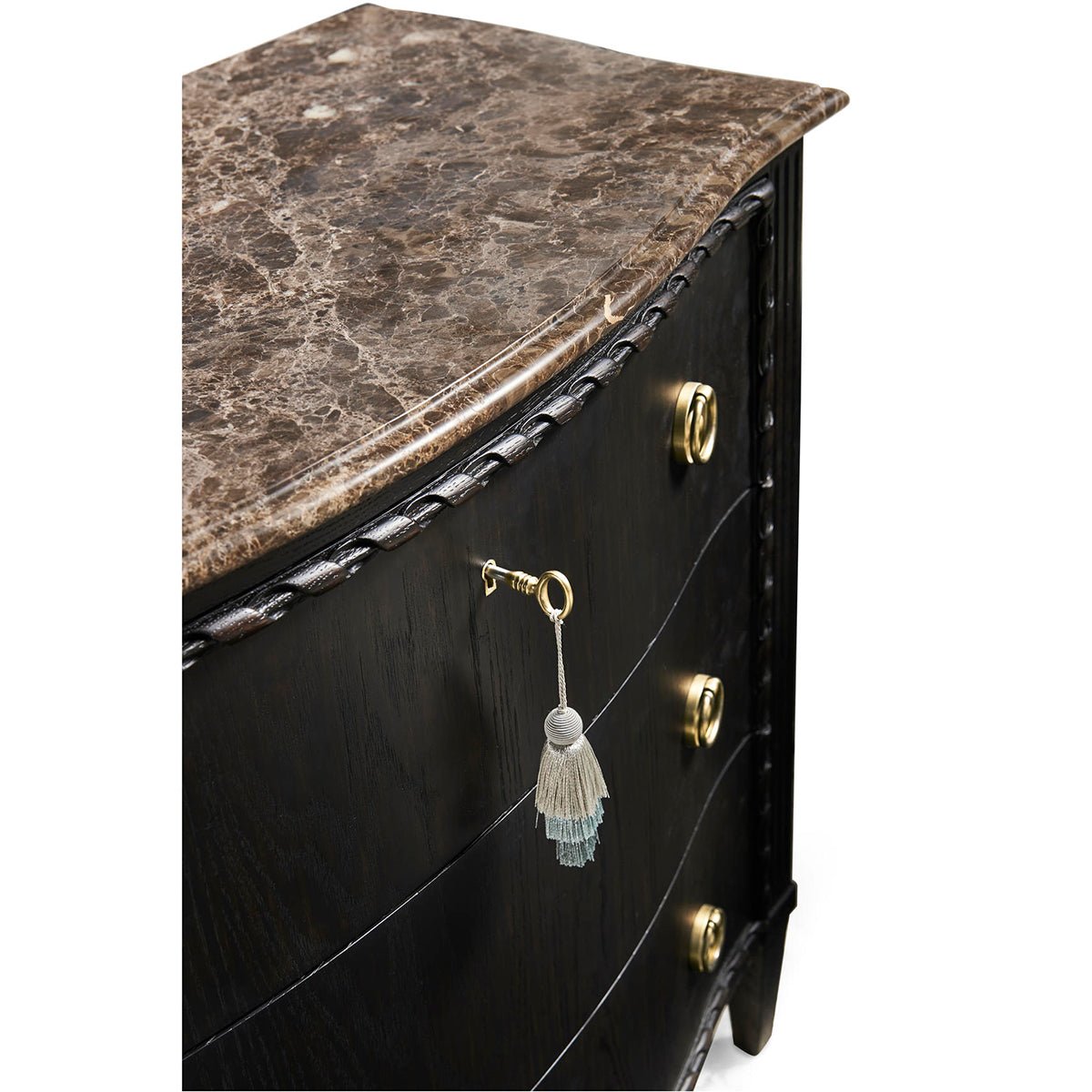 Top view of marble surface, ebonized chest details.