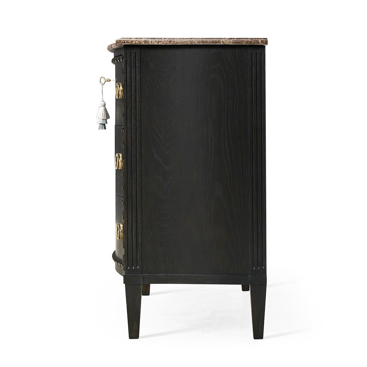 Side profile of ebonized marble top chest, leg design.
