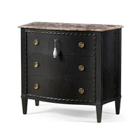 Black marble top chest, angled view, brass handles.
