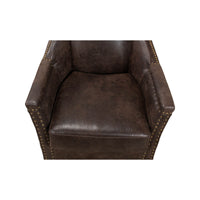 Top view of armchair seat cushion, leather texture visible.