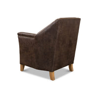 Rear angle of armchair, emphasizing wooden legs.