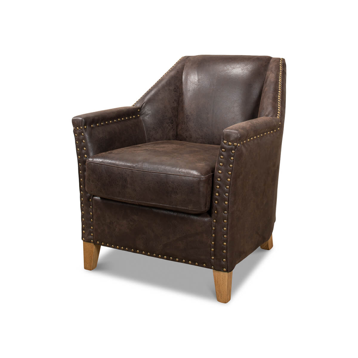 Brown leather armchair with nailhead trim, angled view.