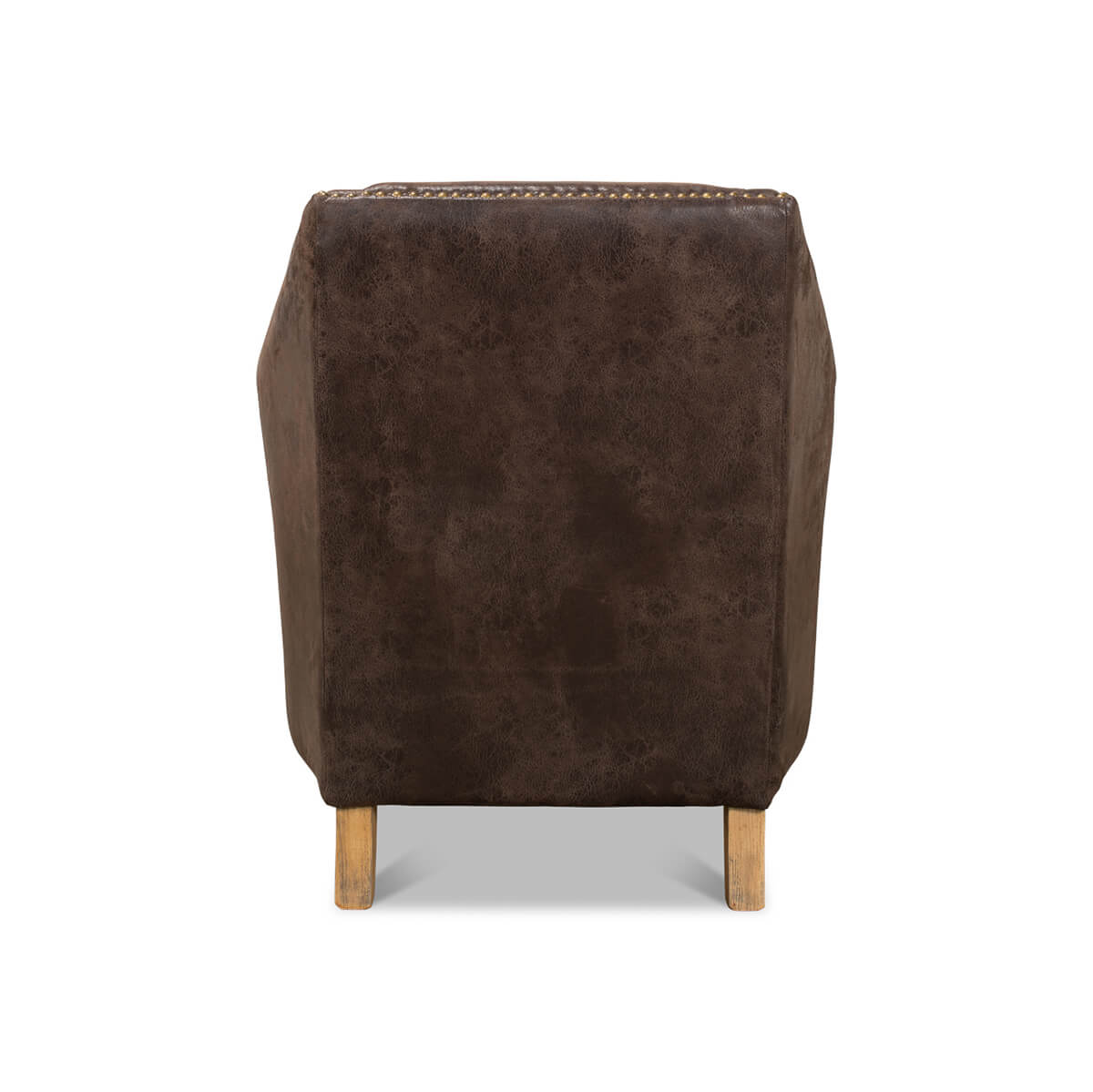 Back view of brown armchair, highlighting leather material.