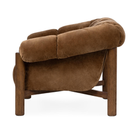 Side view of the Bronze chair with padded arms above an open oak frame
