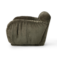 Side view of the Olive Green chair showing fabric gathered beneath its rounded arm